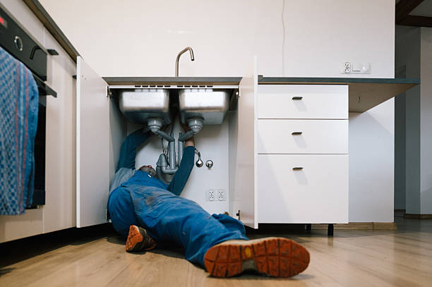 Professional Drain Cleaning technician working in Stonington, CT